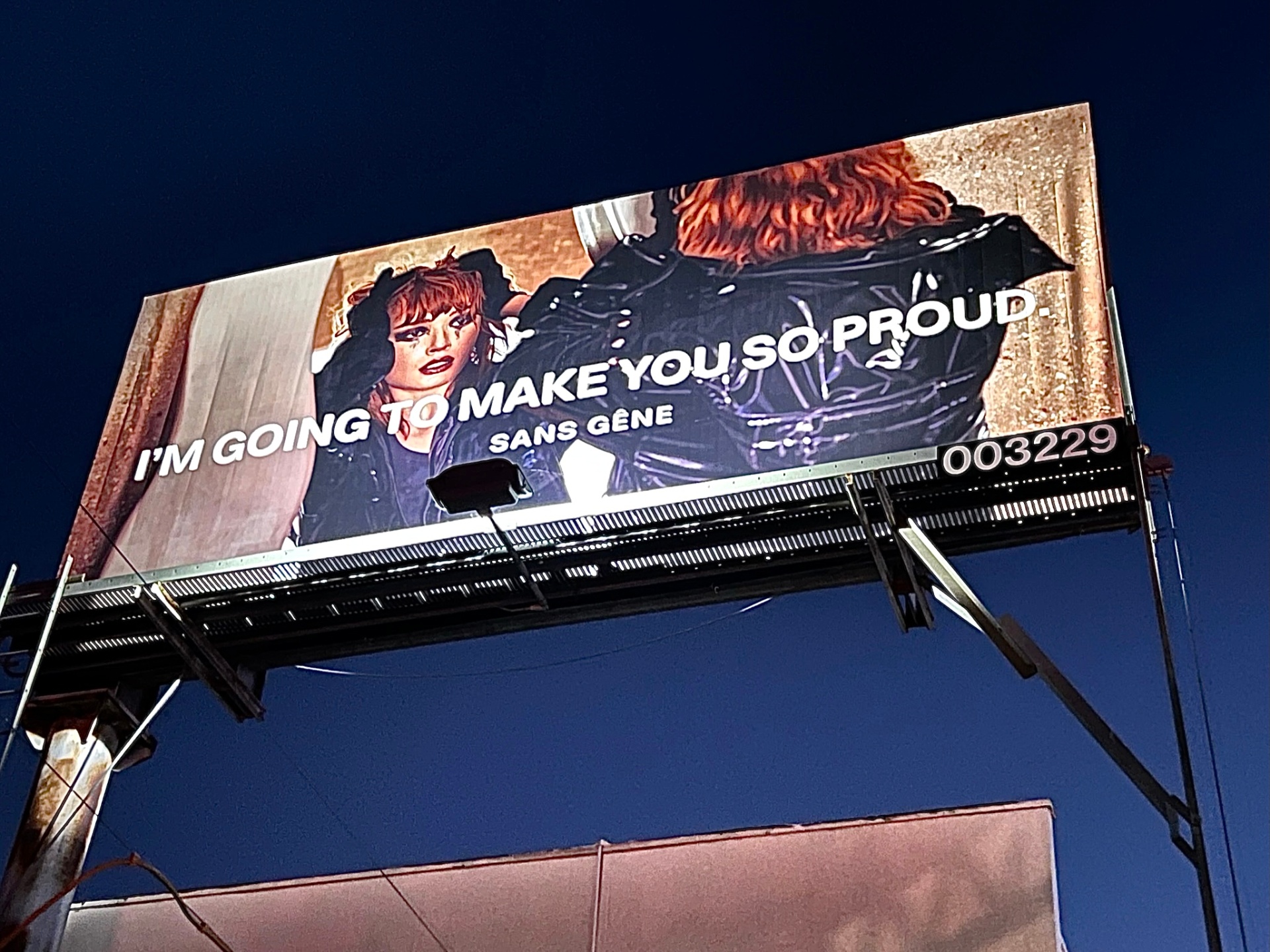 Sans Gêne 'I'm going to make you so proud' billboard at dusk